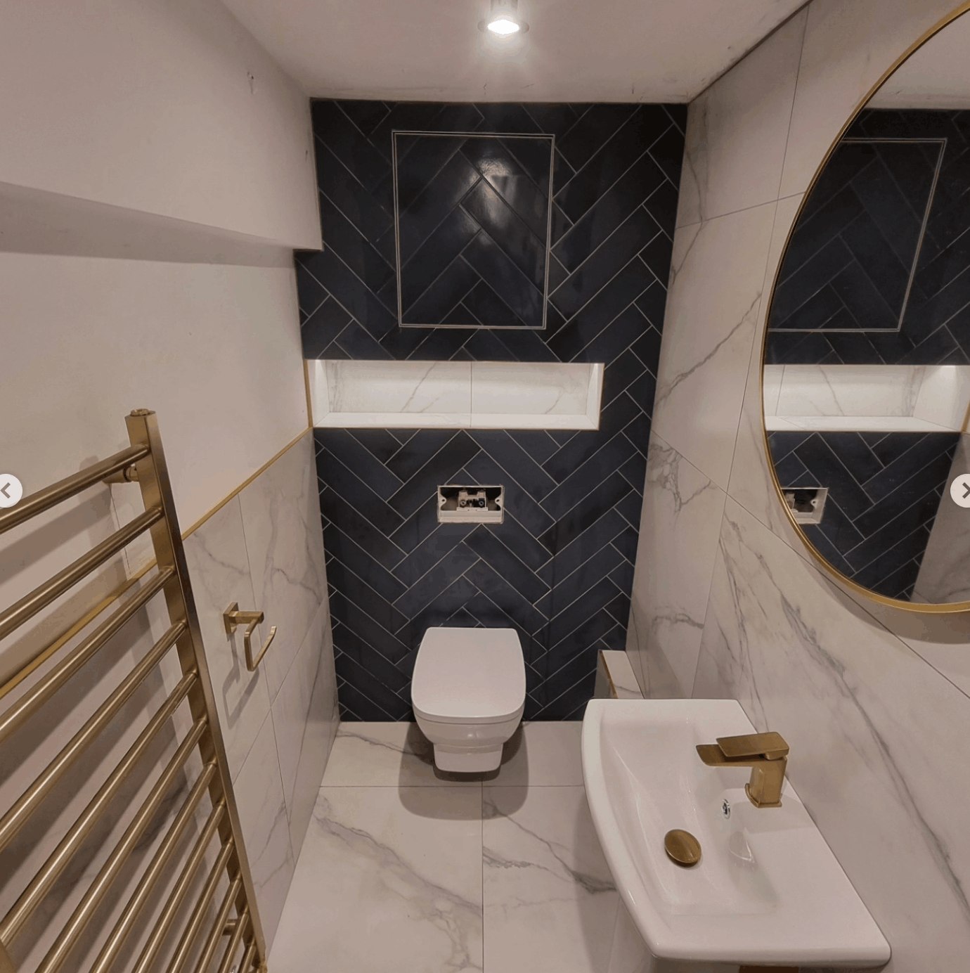 Dark Herringbone Cloakroom with Gold Fixtures